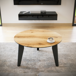 Table basse ronde décor chêne clair Epsilon dans un salon