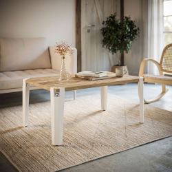 Pied de table basse en acier Saphir, coloris blanc, dans un salon.